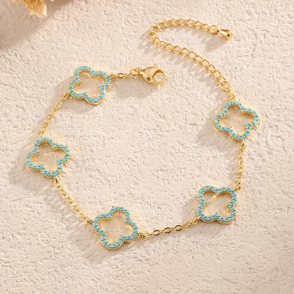 Yupsk Blue Zircon Four-Leaf Flower Bracelet – Hollow Exquisite Jewelry Gift for Women