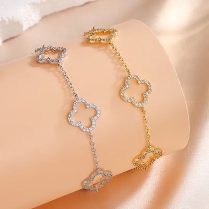 Yupsk Blue Zircon Four-Leaf Flower Bracelet – Hollow Exquisite Jewelry Gift for Women